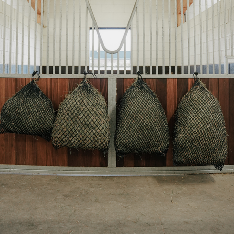 Knotless hay net for horses, designed for gentle slow feeding and improved digestive comfort.